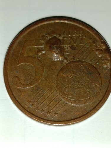 Moneta centesimi di - 5,