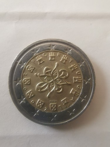 Una moneta euro - una,